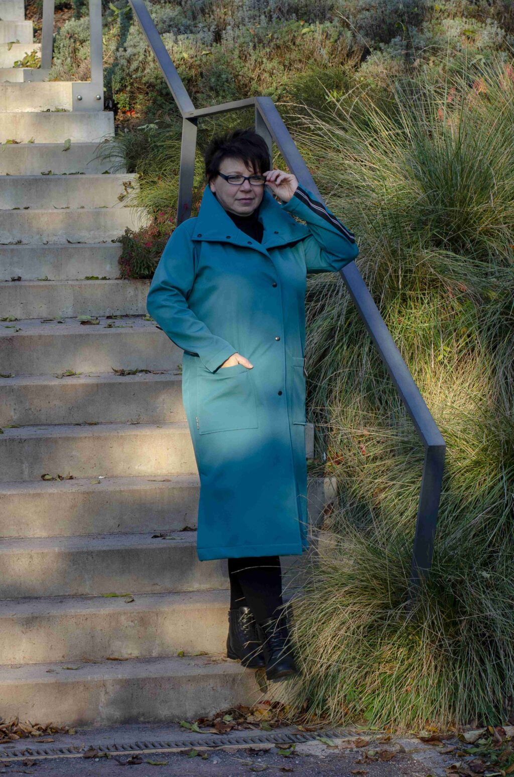 Zimní tyrkysový softhellový oversize kabát na patenty