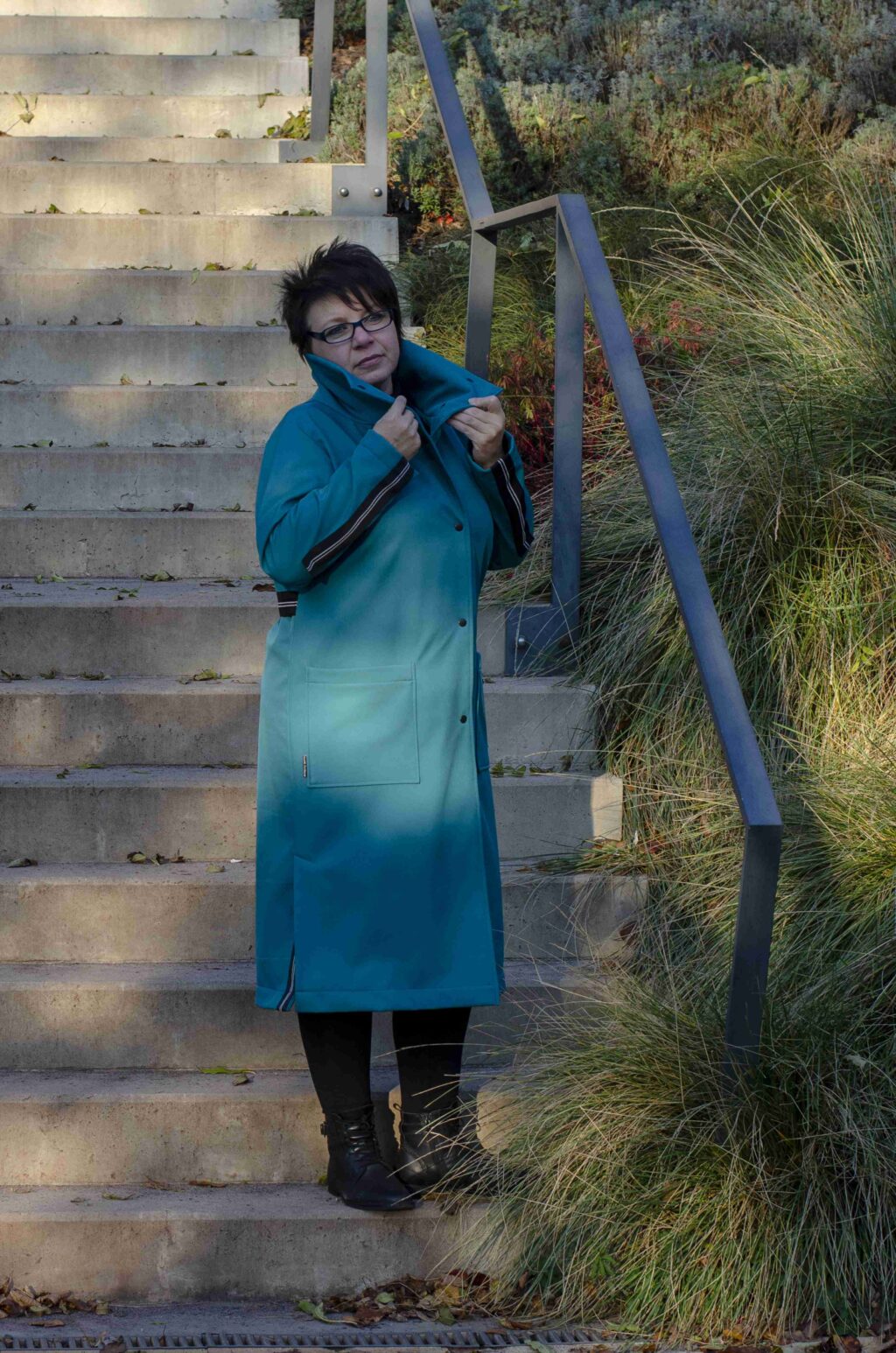 Zimní tyrkysový softhellový oversize kabát na patenty